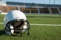 American Football Helmet on Field Royalty Free Stock Photo