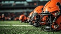 American football helmets at the artificial grass playing field Royalty Free Stock Photo