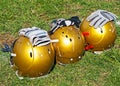 American football helmets and gloves Royalty Free Stock Photo