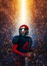 American football player, athlete sportsman in red helmet on stadium background. Sport and motivation wallpaper. Royalty Free Stock Photo