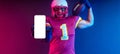 American football player banner with neon lights holding big smartphone with white blank screen in hand. Template for