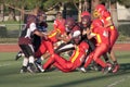 American Football Player Being Tackled During a Ga