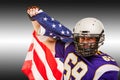 American football player closeup portrait. American football player with an american flag in his hands. Concept