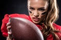 American football player holding ball Royalty Free Stock Photo