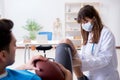 The american football player with injury visiting doctor Royalty Free Stock Photo