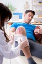 The american football player with injury visiting doctor Royalty Free Stock Photo