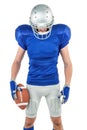 American football player looking down Royalty Free Stock Photo