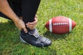 American Football Player With Pain In His Ankle On Field Royalty Free Stock Photo