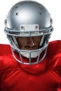 American football player in red jersey looking down Royalty Free Stock Photo