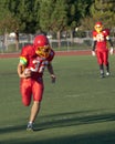 American Football Player Running with the Ball