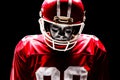 American football player standing in rugby helmet Royalty Free Stock Photo