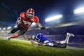 American football players in action on grand arena Royalty Free Stock Photo