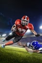 American football players in action on grand arena Royalty Free Stock Photo