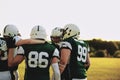 American football players in a huddle during practice Royalty Free Stock Photo