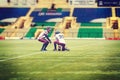 American football players practicing football kickoff