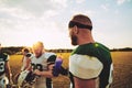 American football players talking together on field after practi Royalty Free Stock Photo