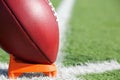 American Football teed up for kickoff Royalty Free Stock Photo