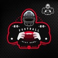 American football. Silhouette of a football player logo emblem on a dark background. Royalty Free Stock Photo