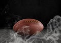 american football in smoke