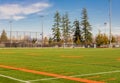 American football and soccer field and grass in sunny spring day Royalty Free Stock Photo