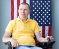 American freedom in wheelchair. USA flag Royalty Free Stock Photo