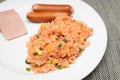 American fried rice, Thai Chinese fried rice dish with `American` side ingredients like ham, hot dogs, raisins, ketchup. Serving o