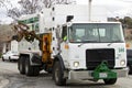 American garbage truck picks up the trash Royalty Free Stock Photo