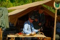 WWII German soldiers plan their next move in a field tent 2