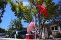 American Home Decorated in Celebration for Fourth of July Independence Day Parade with Blue and Red Stars and Flag