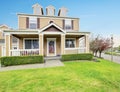 American house exterior with covered porch and columns Royalty Free Stock Photo
