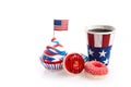 American independence day, celebration and holidays concept - glazed donut, candies, cupcakes in disposable tableware Royalty Free Stock Photo