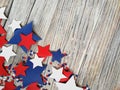 American independence Day, celebration, patriotism and holidays concept - flags and stars on the 4th of July party on top on woode Royalty Free Stock Photo