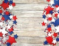 American independence Day, celebration, patriotism and holidays concept - flags and stars on the 4th of July party on top on woode Royalty Free Stock Photo