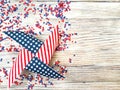 American independence Day, celebration, patriotism and holidays concept - flags and stars on the 4th of July party on top on woode Royalty Free Stock Photo