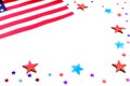 American independence day, celebration, patriotism and holidays concept - red and blue paper stars confetti and flag Royalty Free Stock Photo