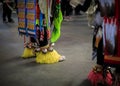 American Indian dancers in handmade beaded leather moccasins decorated with jingle bells at a powwow in San Francisco Royalty Free Stock Photo