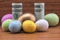 American investment symbolized with gold egg and colorful diversified eggs