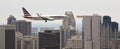 An American Jet on Approach Over Downtown San Diego