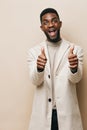 american man african background guy black american young smiling portrait african beige fashion Royalty Free Stock Photo