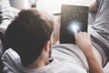 American man check and sending message with email in a tablet. Royalty Free Stock Photo