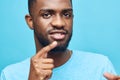 american man expression portrait fashion guy background handsome happy smiling black african blue Royalty Free Stock Photo