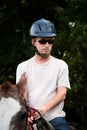 American man on horseback in Costa Rica Royalty Free Stock Photo