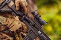 American marine corps special operations soldier preparing tactical and commpunication gear for action battle closeup