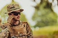 American marine corps special operations soldier preparing tactical and commpunication gear for action battle closeup