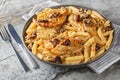 American Marry Me Chicken pasta with sun-dried tomatoes, cheese, herbs and aromatic creamy sauce close-up in a plate. Horizontal Royalty Free Stock Photo