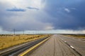 American midwest empty highway under dramatic sky