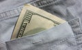 American money in the back pocket of blue jeans. Close-up of 100 dollars banknote. Royalty Free Stock Photo