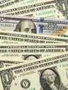 American money close up. A colored 100 dollar bill peeks out of a row of 1 dollar bills. Vertical illustration about the US Royalty Free Stock Photo