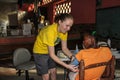 American nurse checks blood pressure of clinic patient in rural Haiti.