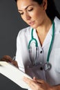 American nurse with stethoscope and clipboard Royalty Free Stock Photo